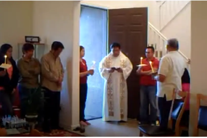 A house blessing ceremony in the Philippines