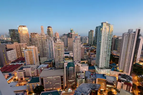 Makati skyline with business and residential buildings.